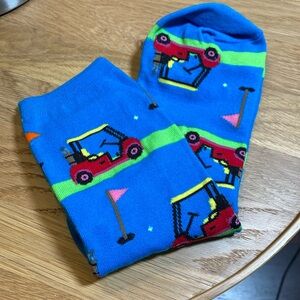 HOT SOX women’s golf socks. NWOT! Never worn. Bright blue w golf carts & flags.